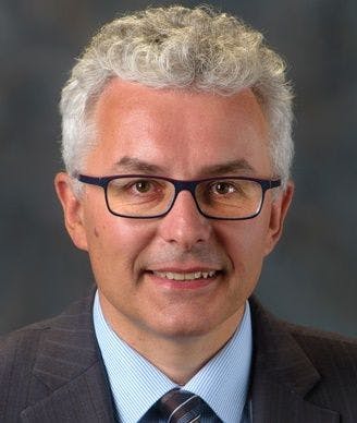 a hematologist/oncologist, professor of medicine, director of the Hanns A. Pielenz Clinical Research Center for Myeloproliferative Neoplasms, and chief of the section for myeloproliferative neoplasms in the department of leukemia at the University of Texas MD Anderson Cancer Center
